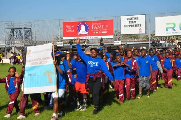 Pupils marching in the Inter-House Sports Competition