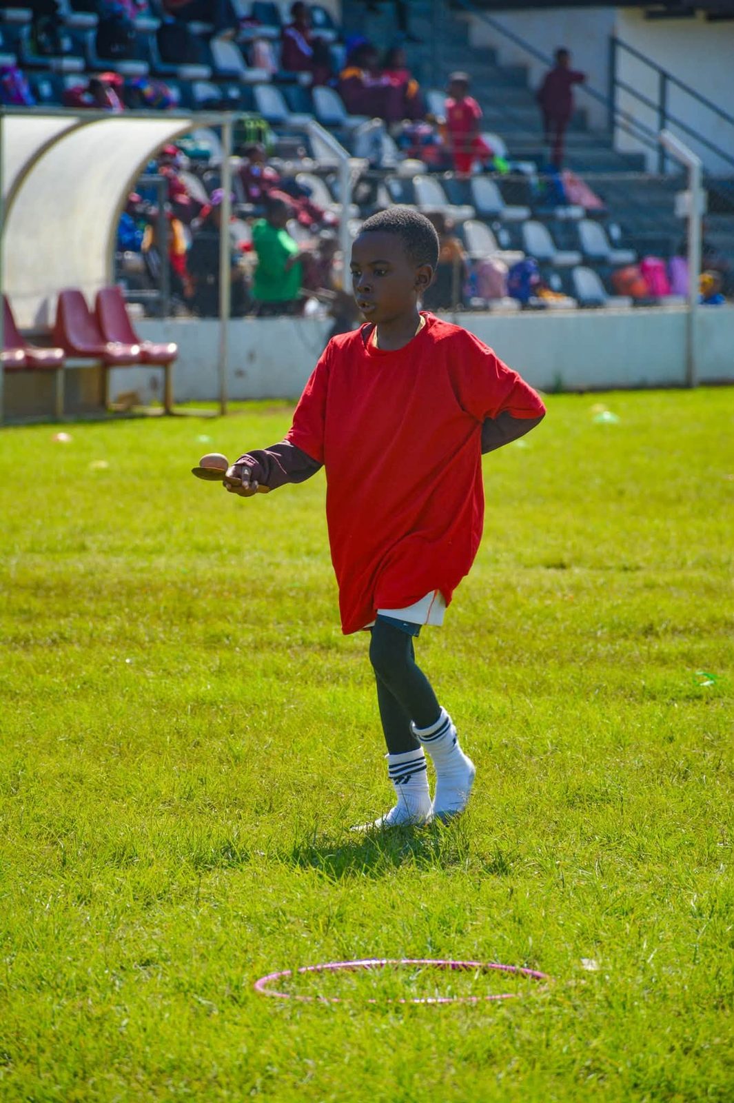 A pupil in mid-stride during Sports Day